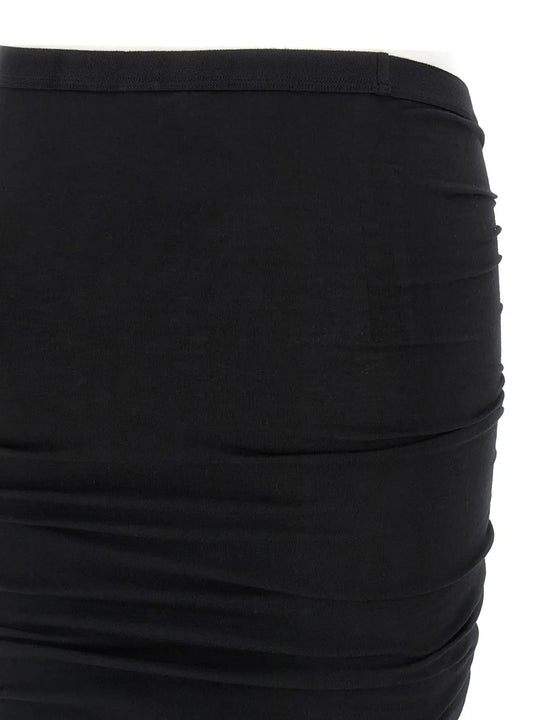 Close up of black skirt, showing texture of the cotton fabric