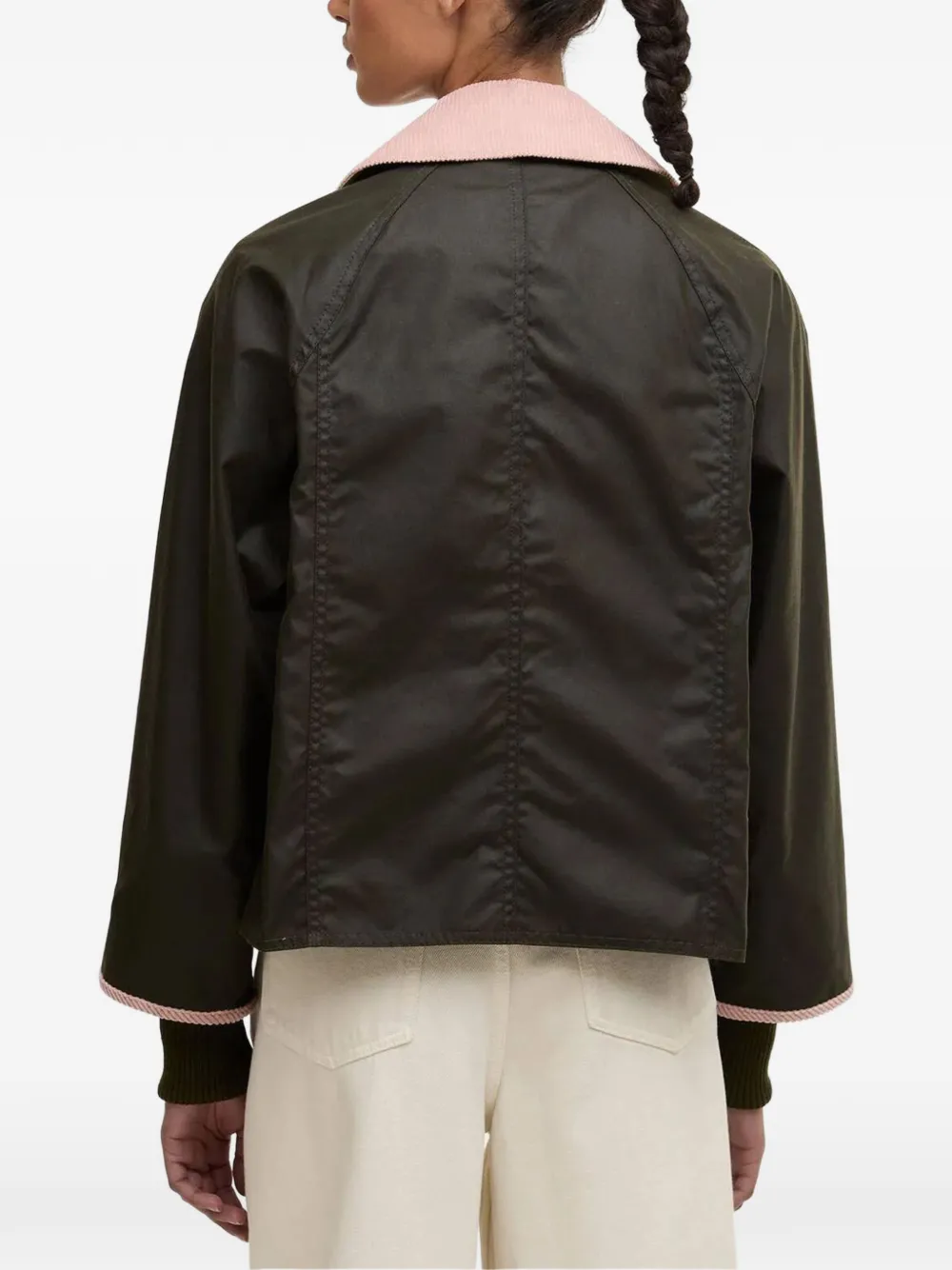 Black jackets-coats worn by a person, showing the jackets-coats's fit