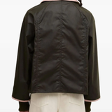 Black jackets-coats worn by a person, showing the jackets-coats's fit