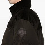 Brown jacket worn by a person, showing the jacket fit