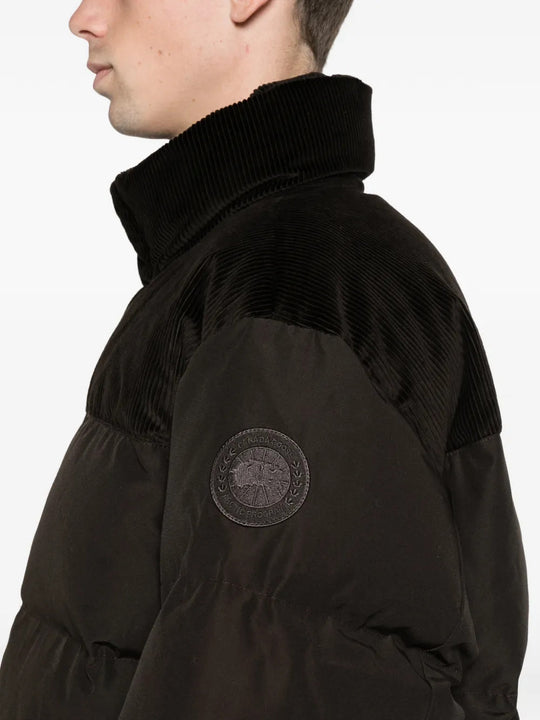 Brown jacket worn by a person, showing the jacket fit