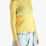 Yellow shirt worn by a person, showing the shirt's fit