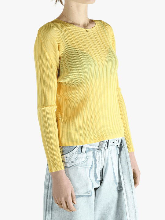 Yellow shirt worn by a person, showing the shirt's fit