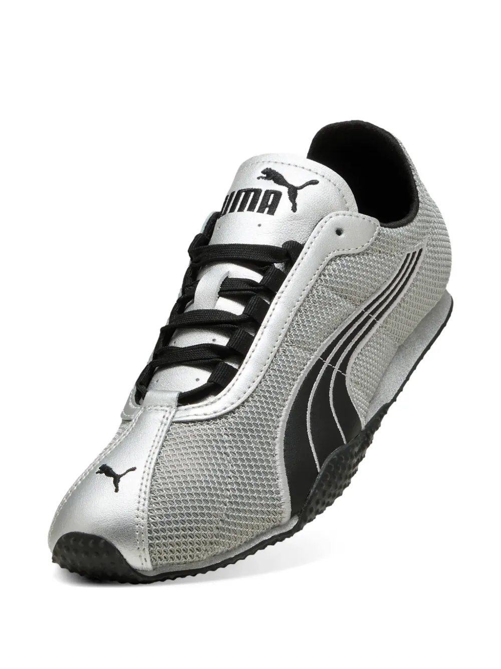 Close up of grey sneaker, showing texture of the Textile and Cow Leather fabric