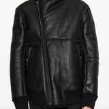 Black jacket worn by a person, showing the jacket fit