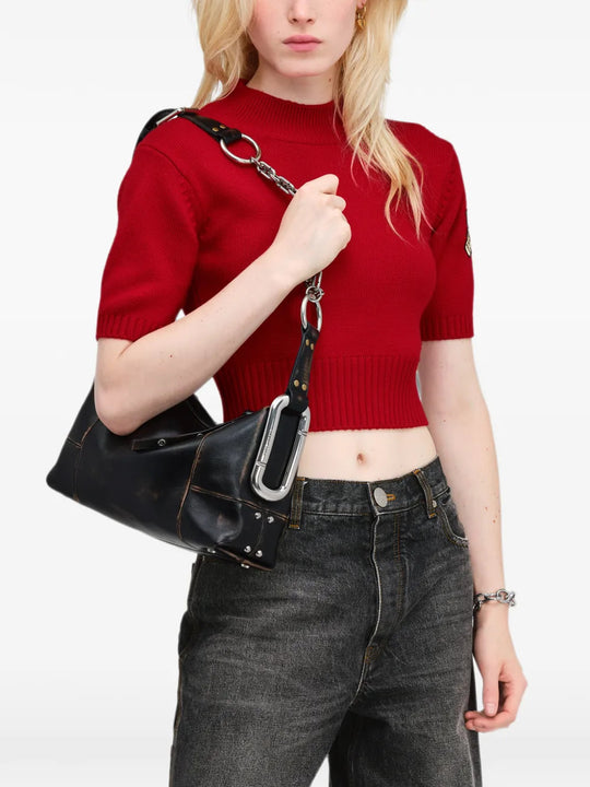 Black bag worn by a person, showing the bag fit
