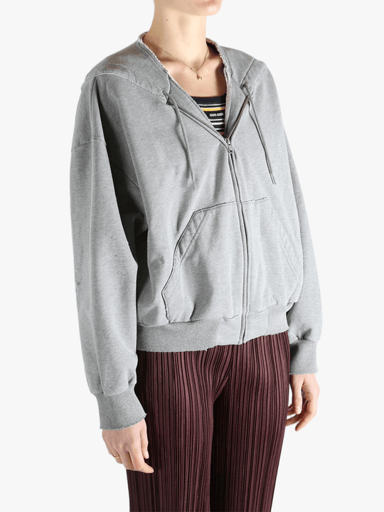 Grey jackets-coats worn by a person, showing the jackets-coats'fit