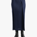 Blue skirt worn by a person, showing the skirt's fit