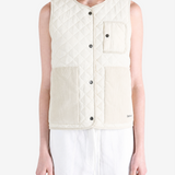 Tan top worn by a person, showing the top fit