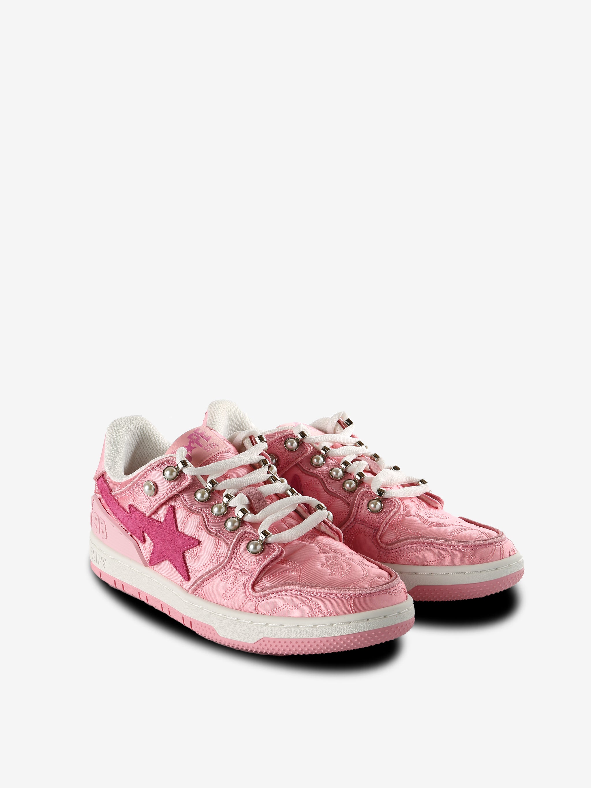 Pink sneakers, side view