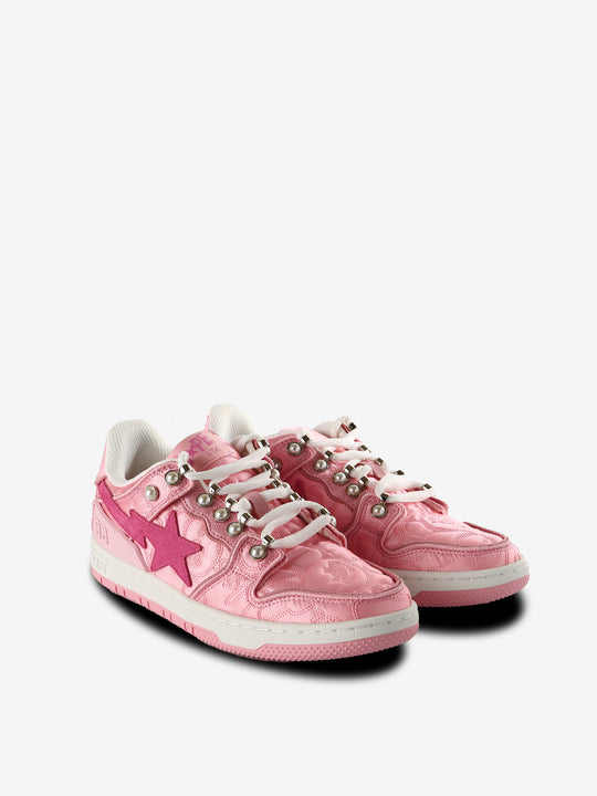 Pink sneakers, side view