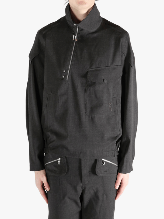 Black jackets-coats worn by a person, showing the jackets-coats's fit