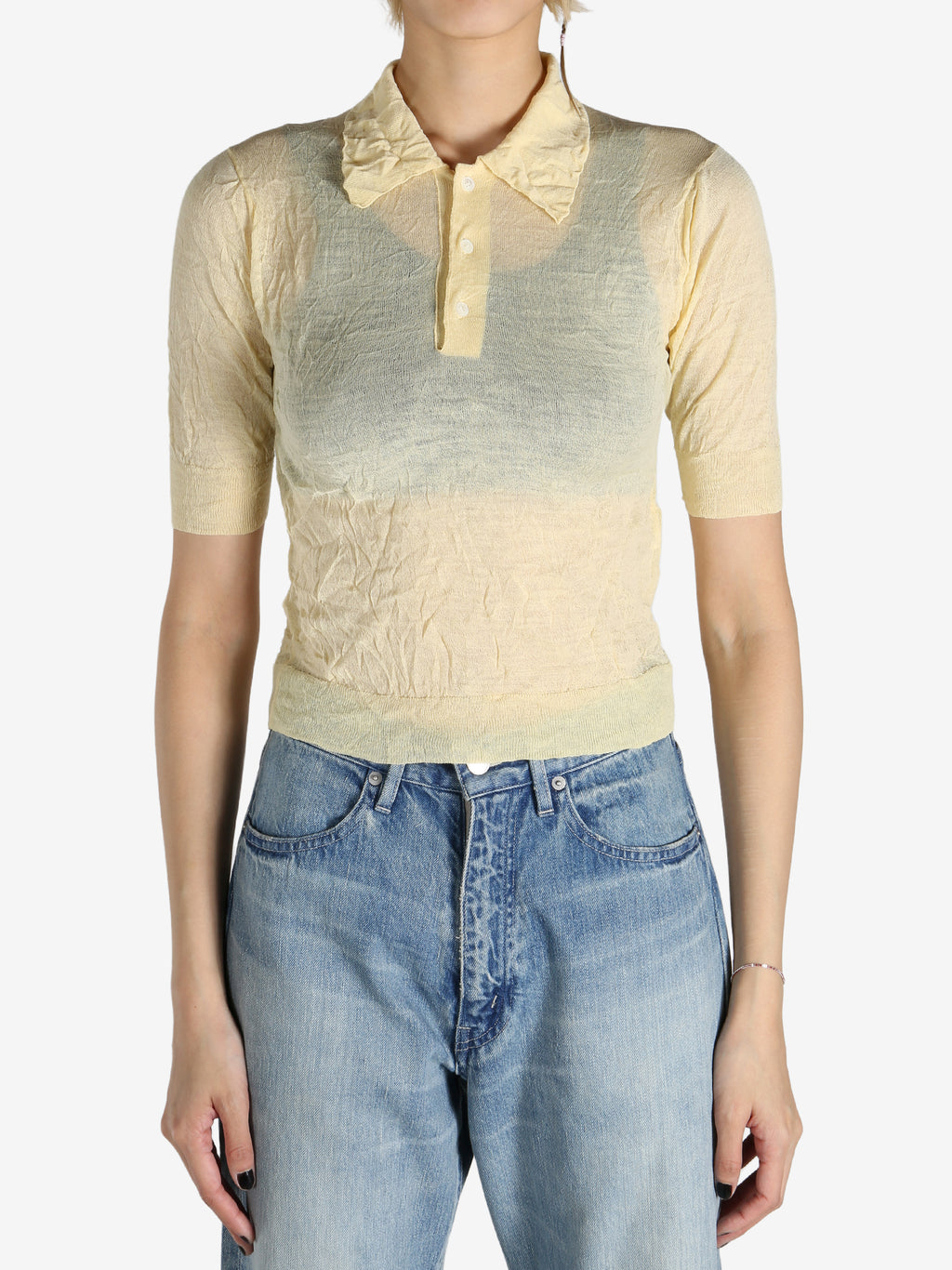 Yellow shirt worn by a person, showing the shirt's fit