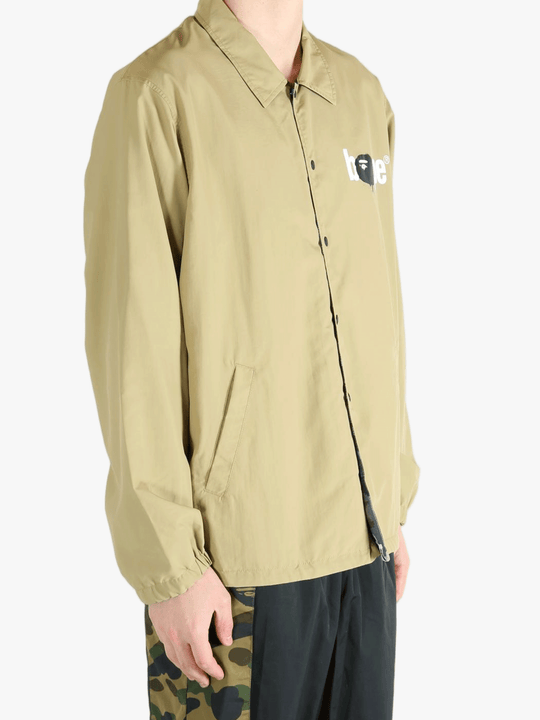 Tan jacket worn by a person, showing the jacket's fit