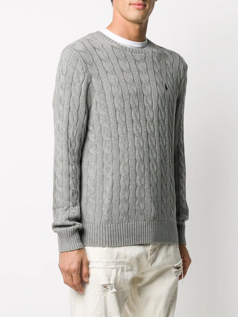 Grey sweater worn by a person, showing the sweater fit