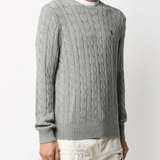 Grey sweater worn by a person, showing the sweater fit