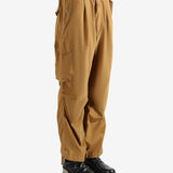 Brown pants worn by a person, showing the pants's fit