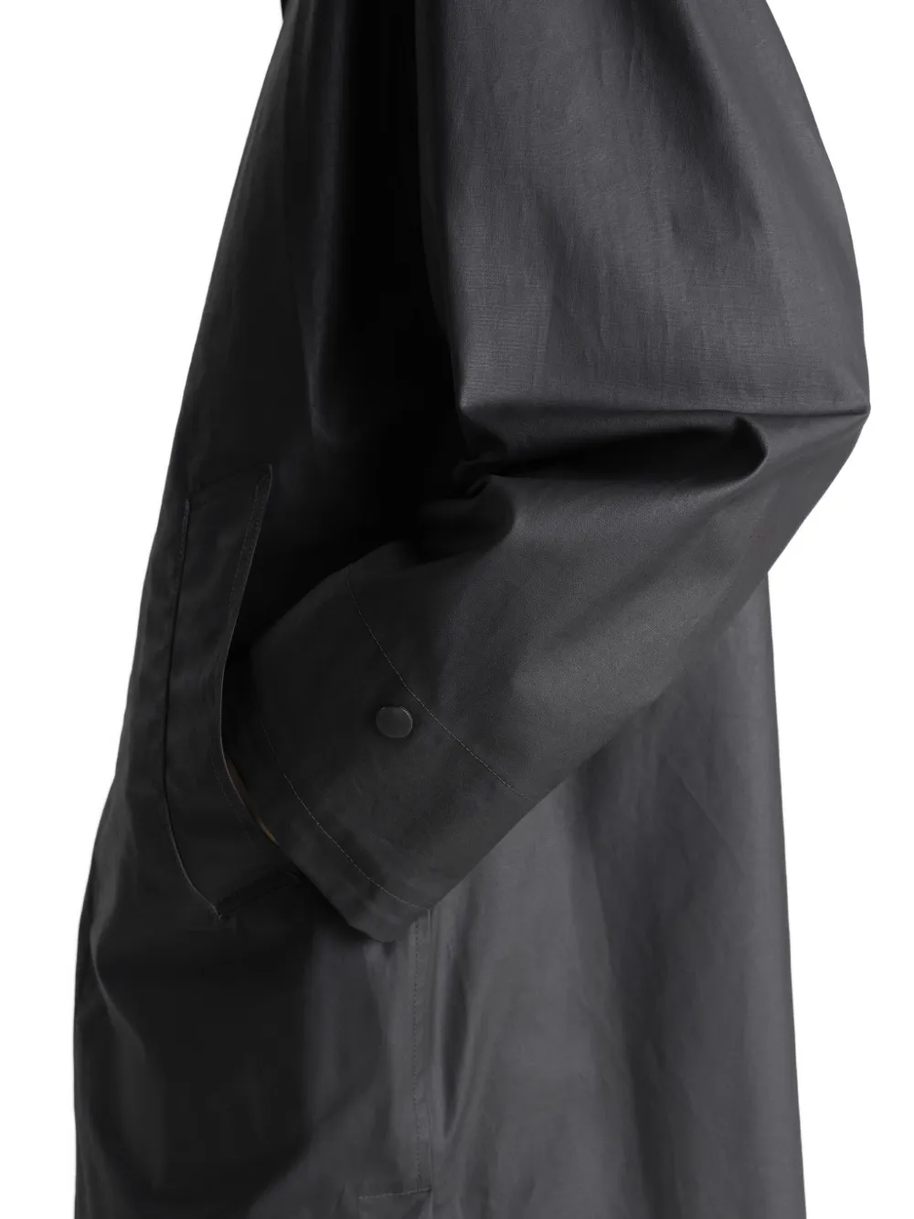 Close up of black jacket, showing the detail of the cotton material