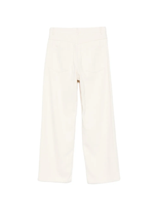 White pants, back view