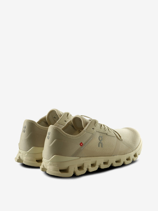 Tan sneakers, back view