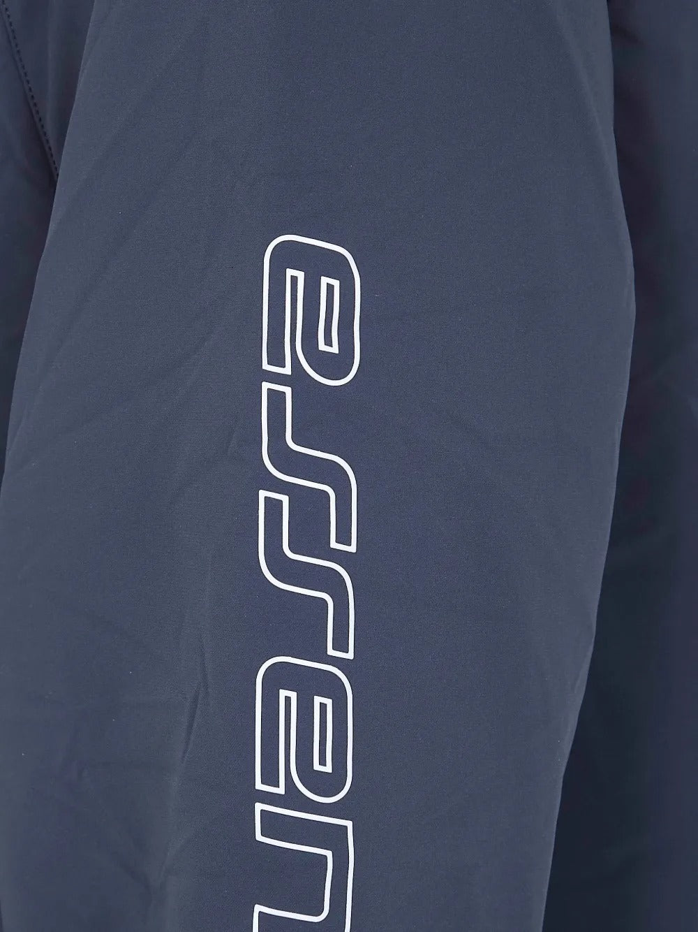 Close up of blue jacket, showing texture of the fabric