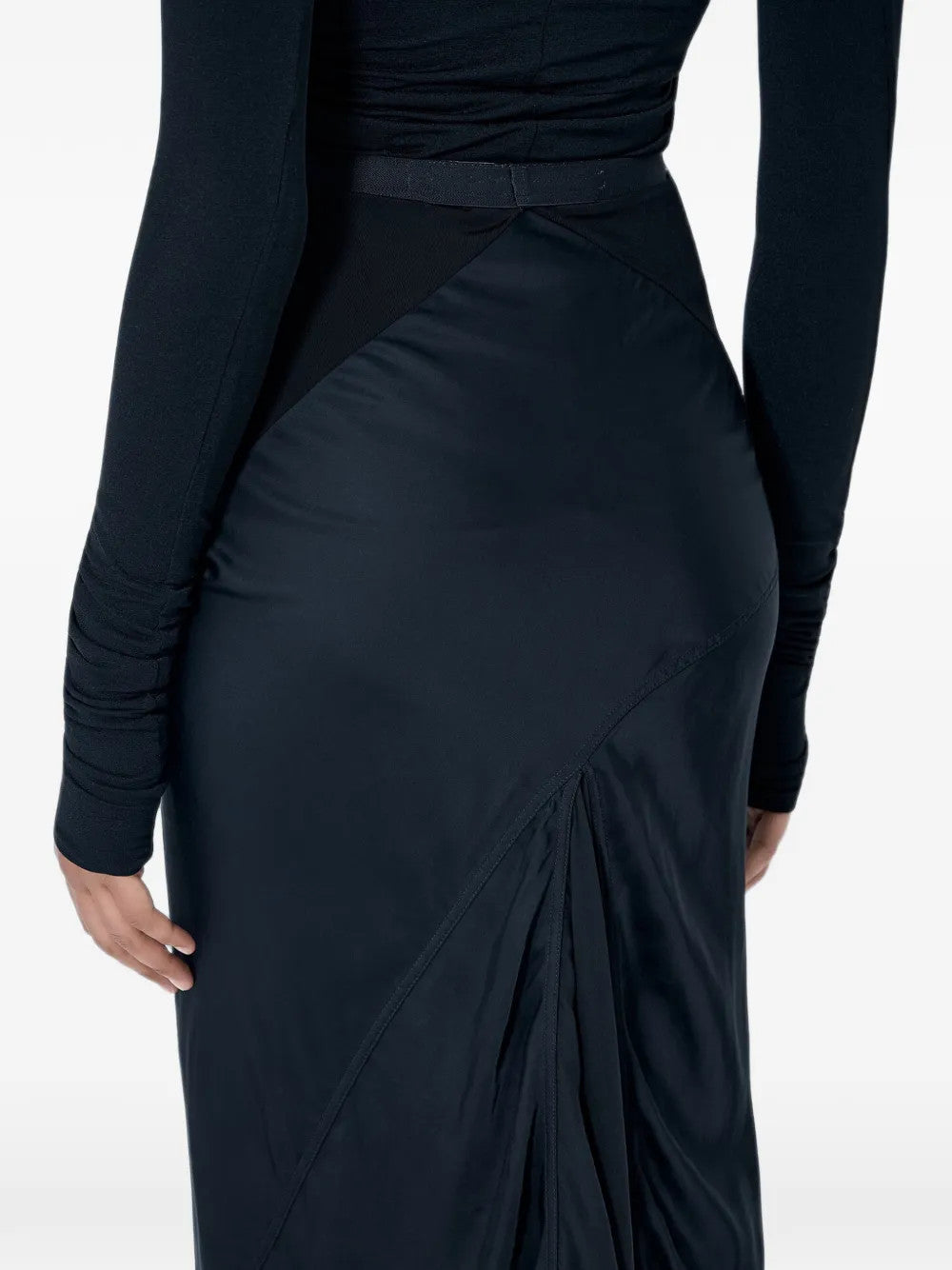 Black skirt worn by a person, showing the skirt fit