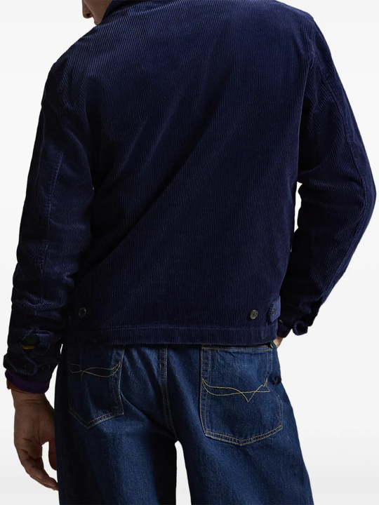 Blue jacket worn by a person, showing the blue jacket's fit