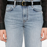 Cloes-up of blue jeans, showing the texture of the cotton fabric