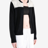 Black hoodie worn by a person, showing the hoodie fit