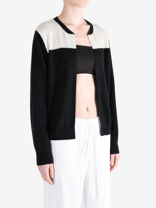 Black hoodie worn by a person, showing the hoodie fit