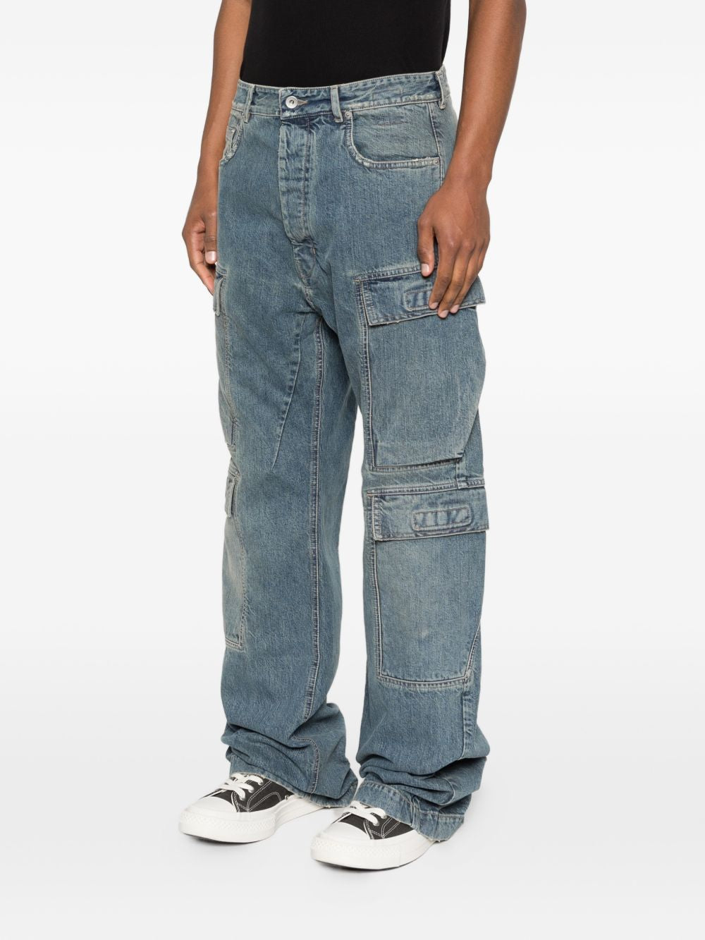 Blue jeans worn by a person, showing the jeans fit