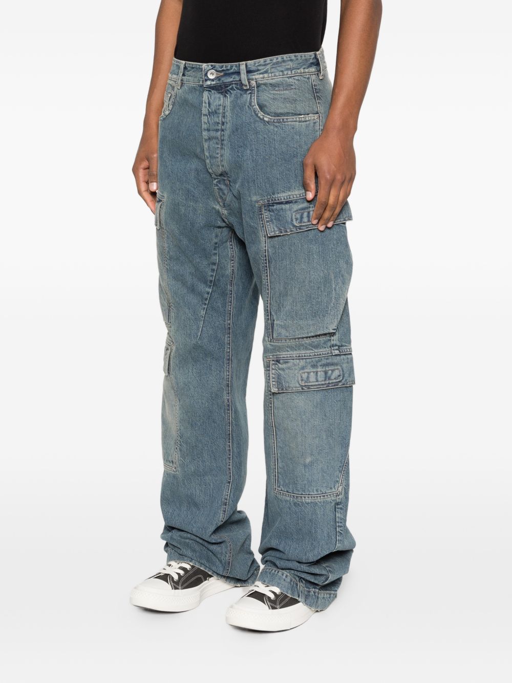 Blue jeans worn by a person, showing the jeans fit