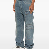 Blue jeans worn by a person, showing the jeans fit