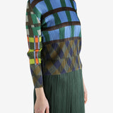 Blue top worn by a person, showing the top's fit