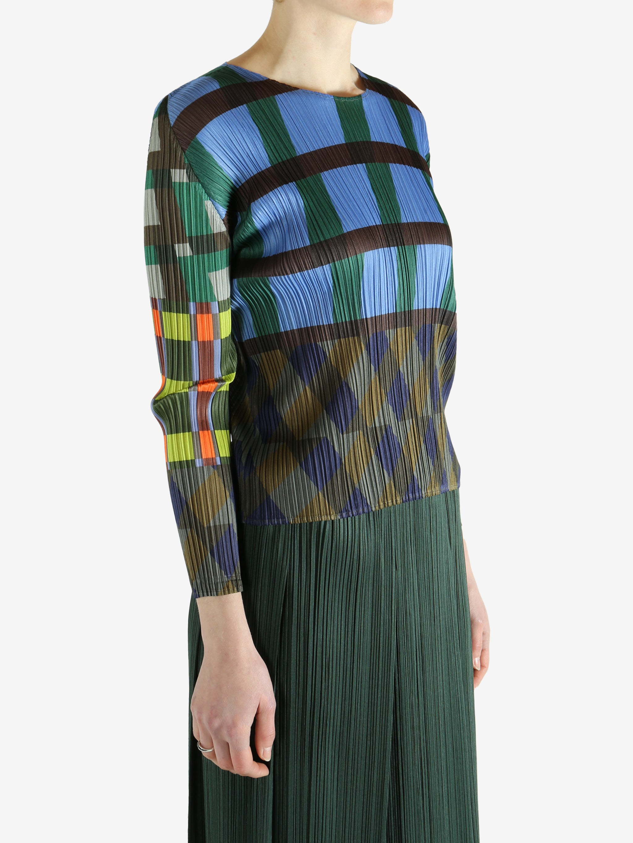 Blue top worn by a person, showing the top's fit