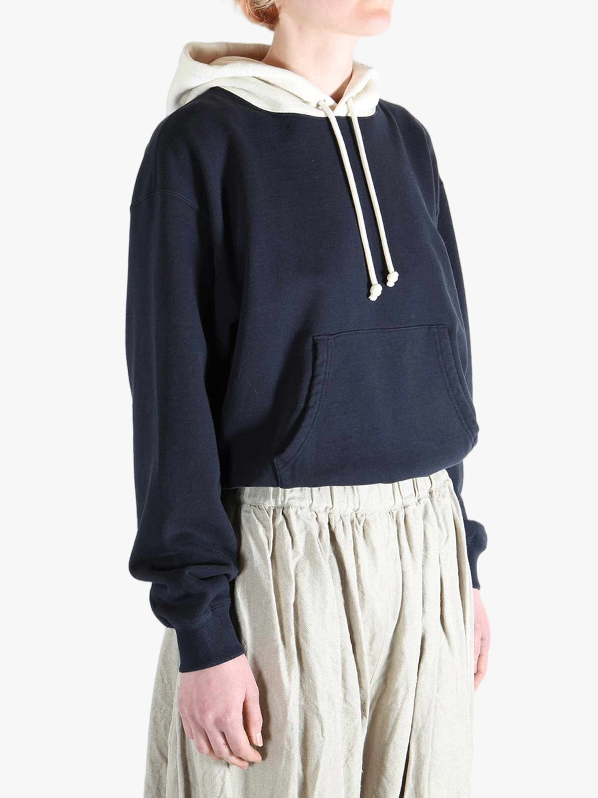 Navy parka worn by a person, showing the parka's fit