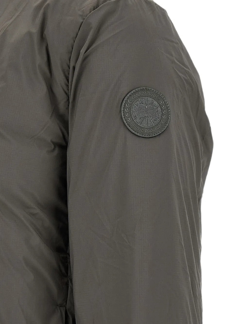 Grey jacket worn by a person, showing the jacket fit
