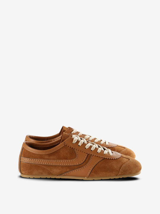 Tan sneakers, front view