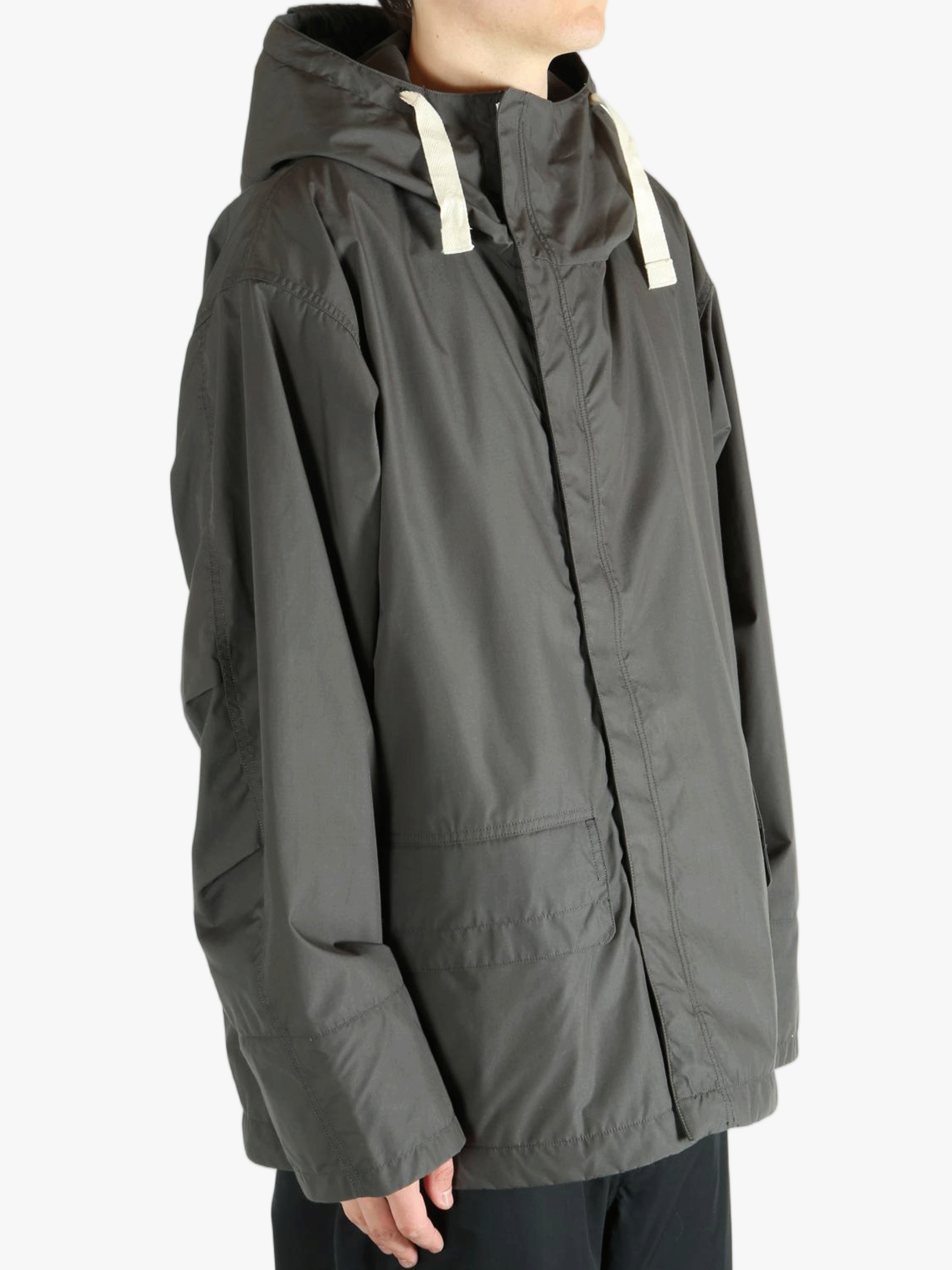 Grey jacket worn by a person, showing the jacket's fit