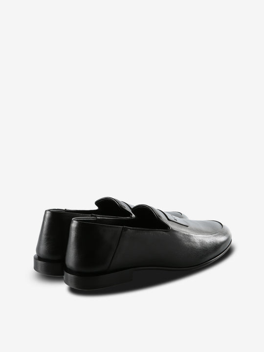 Black loafers,back view