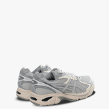 Grey sneakers, back view