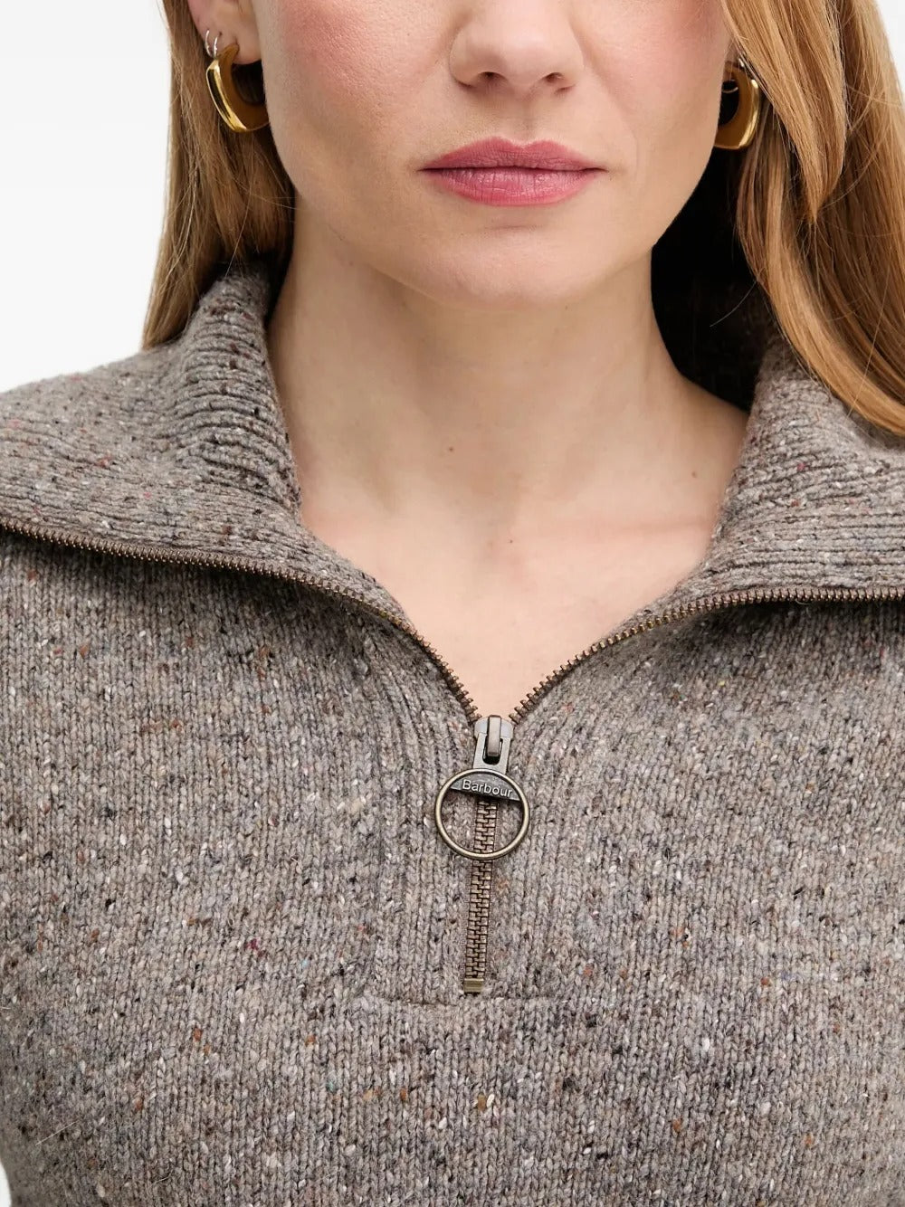 Close up of grey knitwear, showing the texture of cashmere fabric