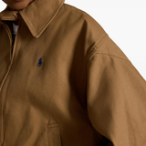 Close up of Brown jacket, showing texture of the cotton fabric