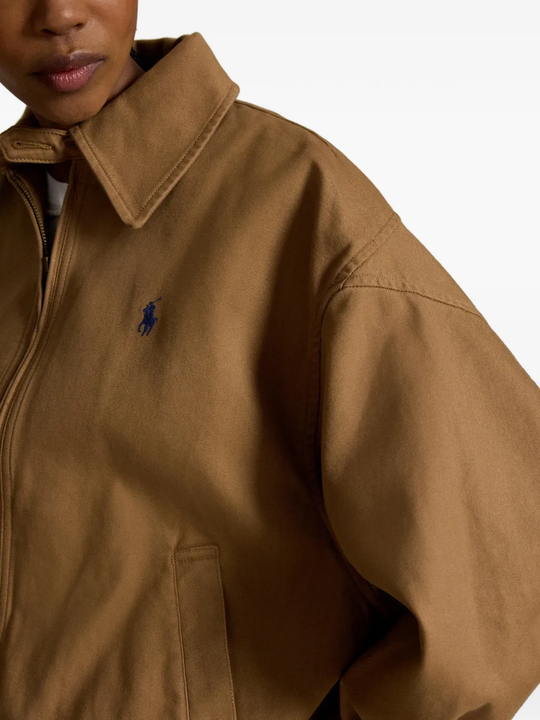 Close up of Brown jacket, showing texture of the cotton fabric