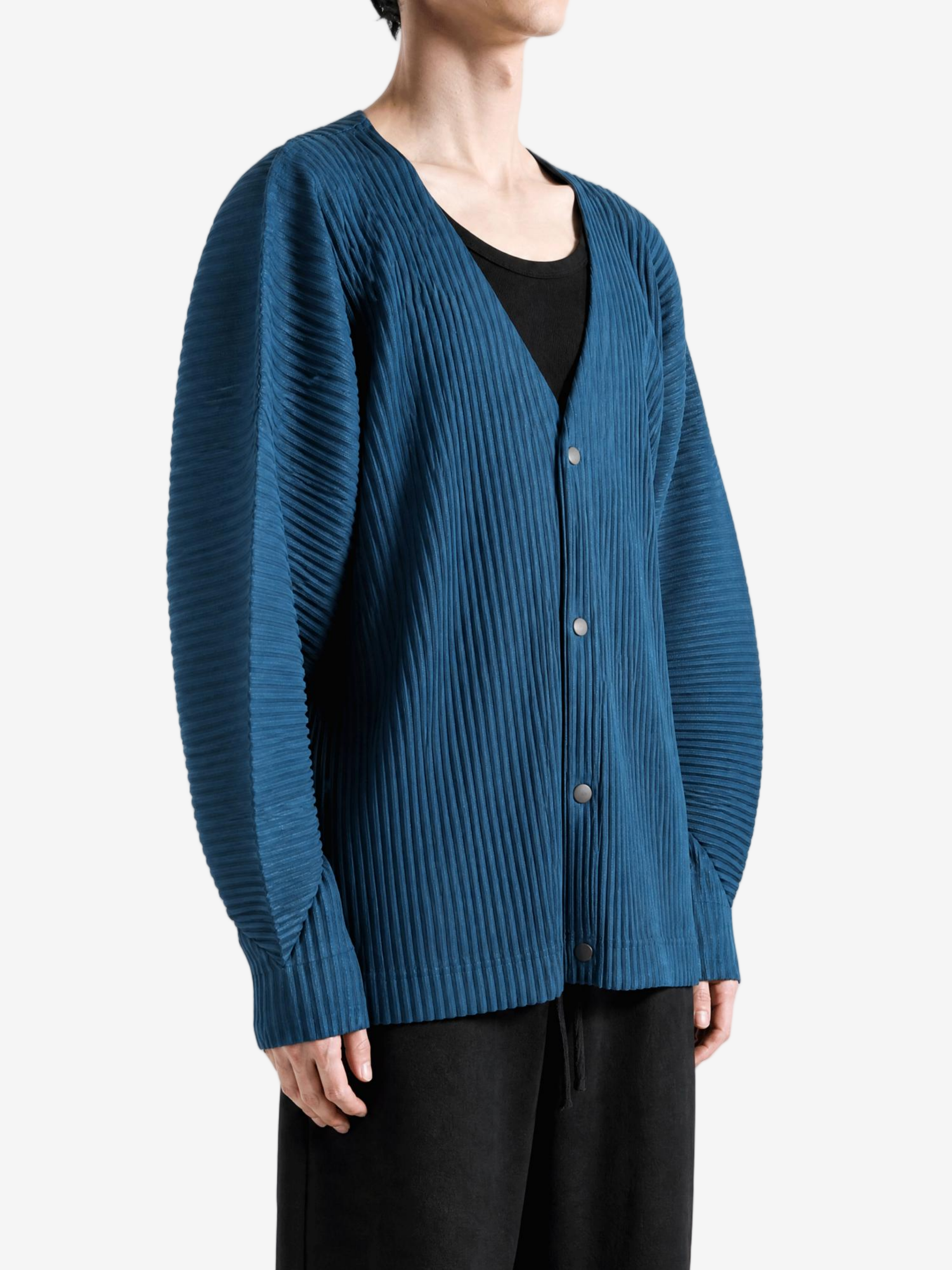 Blue shirt worn by a person, showing the shirt fit