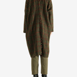 Green coat, full body view