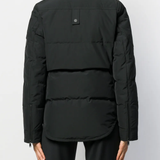 Close up of black jackets, showing texture of the nylon and polyester and feather down fabric