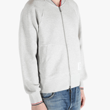 Grey jacket worn by a person, showing the jacket fit