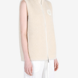 Tan top worn by a person, showing the top fit
