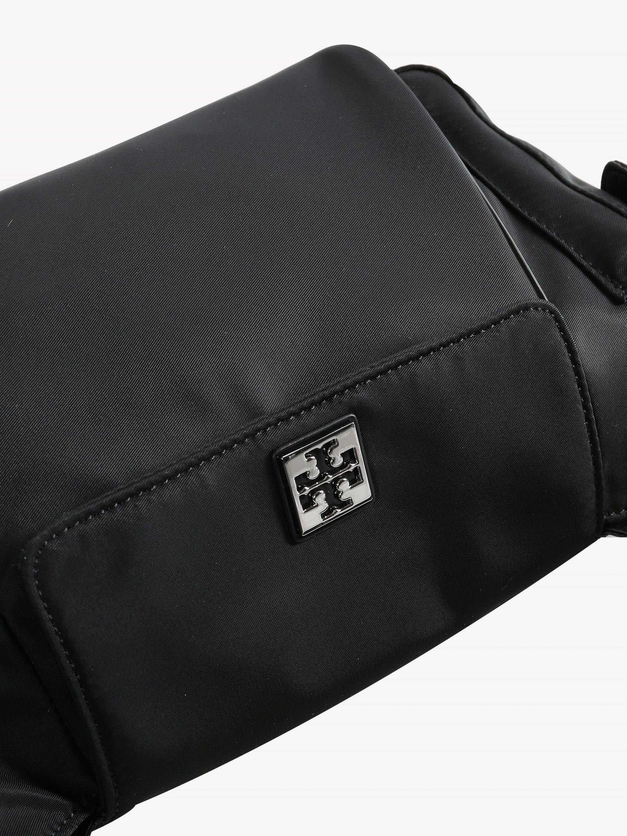 Close up of black bag, showing texture of the nylon fabric